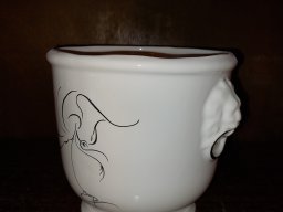 cache pot lion oiseau stylise